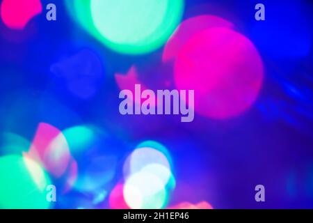 Defocused light dots abstract background. Garland defocus light glare. Stock Photo