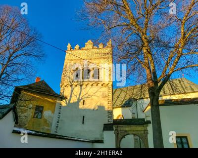 Renaissance bell tower in Basilica of the Holy Cross area, Kezmarok, Slovak republic. Religious architecture. Travel destination. Stock Photo