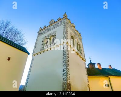 Renaissance bell tower in Basilica of the Holy Cross area, Kezmarok, Slovak republic. Religious architecture. Travel destination. Stock Photo