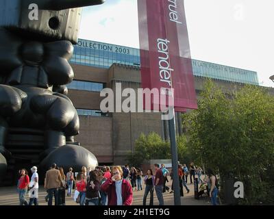 LONDON, UK - CIRCA AUGUST 2003: People visiting Tate Modern art gallery in South Bank power station Stock Photo