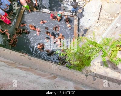 Soufriere, Saint Lucia - May 12, 2016: The tourists swimming at the Sulphur Springs Drive in volcano near Soufriere on 12 may 2016 at Saint Lucia isla Stock Photo