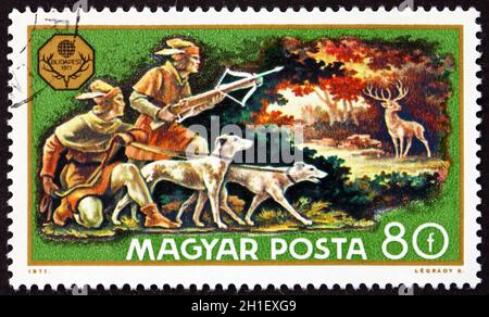 HUNGARY - CIRCA 1971: a stamp printed in Hungary shows Deer Hunt, World Hunting Exhibition, Budapest, circa 1971 Stock Photo