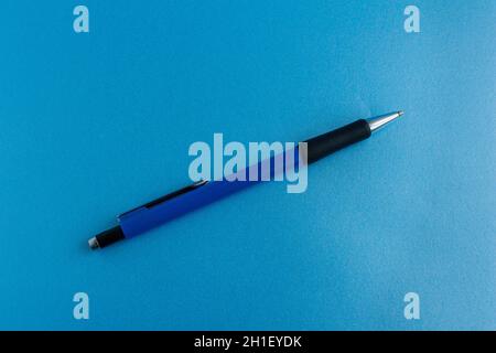 Blue pencil, top view of pencil isolated on blue background. Stock Photo