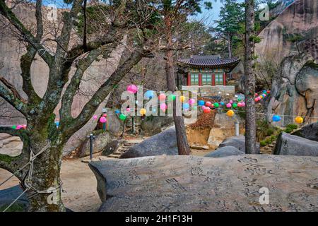 SEORAKSAN, SOUTH KOREA - APRIL 14, 2017: Kyejoam Seokgul Hermitage shrine and Ulsanbawi rock in Seoroksan National park, South Korea Stock Photo