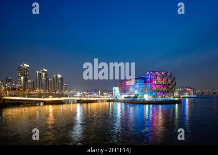 SEOUL, SOUTH KOREA - APRIL 7, 2017: Some Sevit culture complex on artificial floating islands located near the Banpo Bridge illuminated at night, Seou Stock Photo