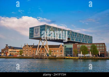 ROTTERDAM, NETHERLANDS - MAY 11, 2017: Unilever Bestfoods headquarters building De Brug (The Bridge) built over an existing historical factory from 18 Stock Photo