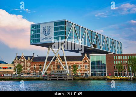 ROTTERDAM, NETHERLANDS - MAY 11, 2017: Unilever Bestfoods headquarters building De Brug (The Bridge) built over an existing historical factory from 18 Stock Photo