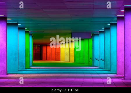 ROTTERDAM, NETHERLANDS - MAY 11, 2017: Colorful mulitcolored illuminated gallery tunnel rainbow passage installation under NAI building, Nederlands Ar Stock Photo