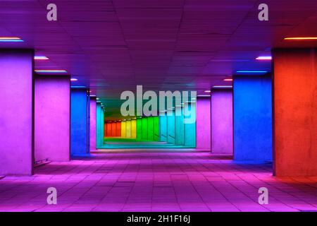 ROTTERDAM, NETHERLANDS - MAY 11, 2017: Colorful mulitcolored illuminated gallery tunnel rainbow passage installation under NAI building, Nederlands Ar Stock Photo