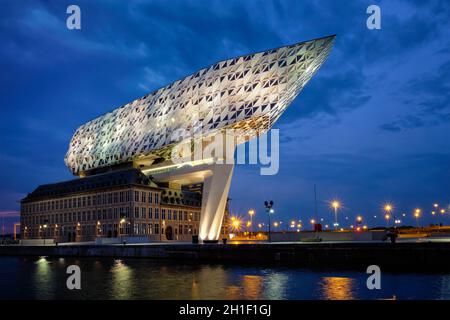 ANTWERP, BELGIUM - MAY 27, 2018: Port authority house (Porthuis) designed by famous Zaha Hadid Architects which was her last project illuminated in th Stock Photo