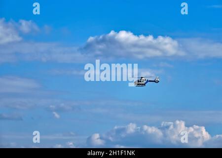 MUNICH, GERMANY - JULY 08, 2018: Police helicopter in the sky. Stock Photo
