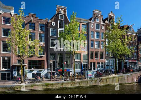AMSTERDAM, NETHERLANDS - MAY 8, 2017: Amsterdam Red-lights district De Wallen. It is the largest and best known red-light district in Amsterdam and po Stock Photo