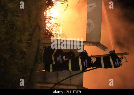 salvador, bahia / brazil - january 23, 2018: Firefighters fight Fire in chemical toilets deposit in Barros Reis neighborhood in Salvador. *** Local Ca Stock Photo
