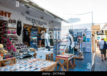 SANTORINI, GREECE - APRIL, 2018: Stores at Perissa beach in Santorini Island Stock Photo