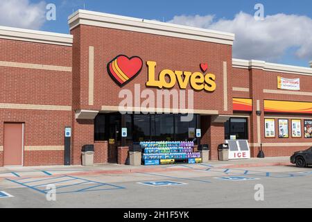 Tipton - Circa October 2021: Love's Travel Stop gas station and convenience store. Love's operates over 500 truck stops and travel restaurants. Stock Photo