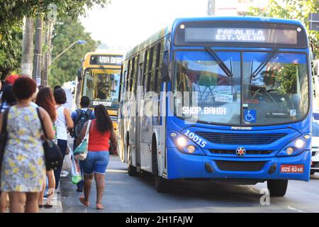 salvador, bahia / brazil  - january 26, 2017: Person is seen waiting for public transportation at a bus stop on Avenida Tancredo Neves, in the city of Stock Photo