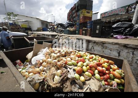 feira de santana, bahia / brazil - may 15, 2019: Food is thrown in the trash at a free fair in the citu of Feira de Santana. *** Local Caption *** Stock Photo