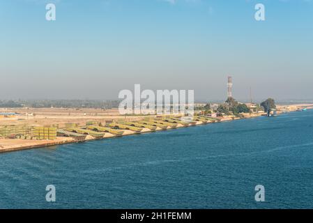 El Qantara, Egypt - November 5, 2017: Pontoons bridge for crossing the Suez Canal lie on the shore of canal near El Qantara, Egypt. Stock Photo