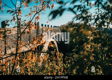 Abandoned bridge over the Kazanka River in Kazan. The general desolation of the area.  Stock Photo