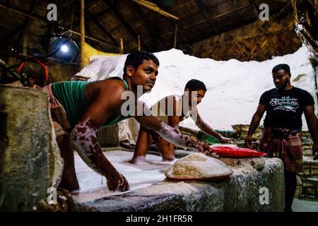 Chittagong, Bangladesh, December 22, 2017: Hard labor in a salt factory in Chittagong, Bangladesh Stock Photo