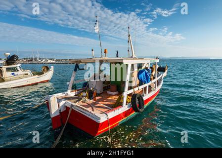 Katakolon, Greece - October 31, 2017: Colorful wooden fishing boats in harbor of the Katakolon (Olimpia), Greece. Stock Photo