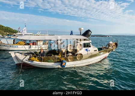 Katakolon, Greece - October 31, 2017: Colorful wooden fishing boats in harbor of the Katakolon (Olimpia), Greece. Stock Photo