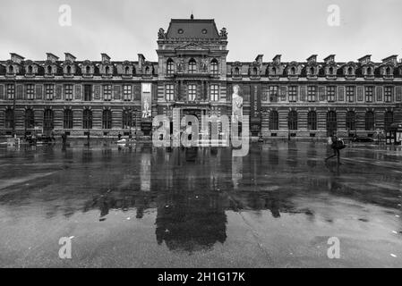 Paris, France - December 23, 2018: The Passage Richelieu in the rain, which is part of the Louvre in Paris, France. Paris is one of the most popular t Stock Photo