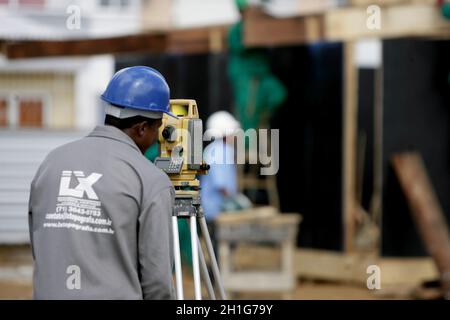salvador, bahia / brazil - march 3, 2016: surveyor is seen making measurements under construction at the Municipal Hospital in the city of Salvador. * Stock Photo