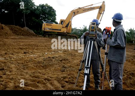 salvador, bahia / brazil - march 3, 2016: surveyor is seen making measurements under construction at the Municipal Hospital in the city of Salvador. * Stock Photo