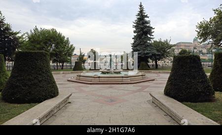 Budapest, Hungary - July 13, 2015: Water Fountain With Sculpture at Vigado Park in Budapest, Hungary. Stock Photo