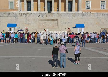 Athens, Greece - May 04, 2015: Tourists Crowds and Changing Guards Ceremony in Front of Hellenic Parliament Building in Athens, Greece. Stock Photo