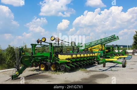 Kyiv, Ukraine - June 28, 2020: Large modern high-precision seeder JOHN DEERE Maxemerge-Xp at road at Kyiv, Ukraine on June 28, 2020. Agricultural mach Stock Photo