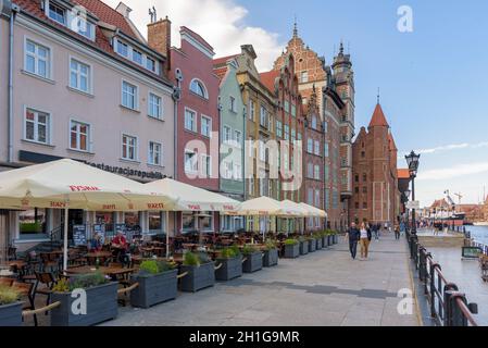 Gdansk, Poland - June 14, 2020: People walk famous promenade at Motlawa river in the city downtown Stock Photo