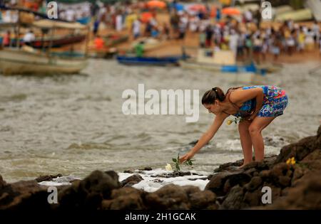 salvador, bahia / brazil - february 2, 2016: supporters of candomble are seen on the Rio Vermelho beach in the city of Salvador during a party in hono Stock Photo