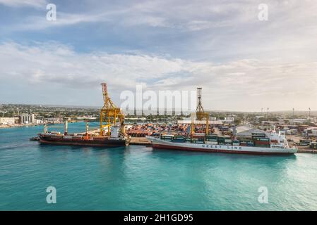 Bridgetown, Barbados - December 18, 2016: Container ships moored in port of Bridgetown, Barbados island, Caribbean.