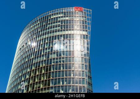 Berlin, Germany - May27, 2017: Deutsche Bahn sign on glass skyscraper in Potsdamer Platz. Deutsche Bahn AG is a German railway company. The company ca Stock Photo