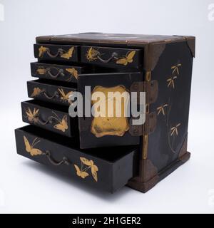 Antique Japanese Gilt Lacquered Jewellery Cabinet With Insect Decoration. Late Meiji Period Stock Photo