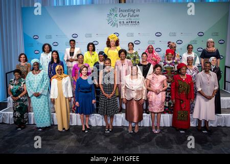 Washington, United States of America. 06 August, 2014. U.S First Lady Michelle Obama and former First Lady Laura Bush, center, take part in a group photo with the U.S.-Africa Leaders Summit spouses at the John F. Kennedy Center for the Performing Arts August 6, 2014 in Washington, D.C. Credit: Lawrence Jackson/White House Photo/Alamy Live News Stock Photo