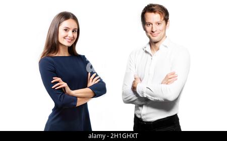 Business woman and man on white background. crossing arms. Smiling happy couple on white background facing camera. Business portrait of two people. Te Stock Photo