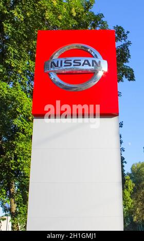 Kyiv, Ukraine - July 29, 2020: Nissan dealership logo. Nissan Motor Corporation is a Japanese multinational automobile manufacturer headquartered in N Stock Photo