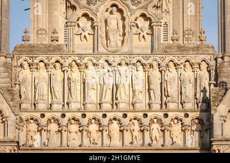 WELLS, UK - October 07, 2011. Christ the Judge with the twelve apostles. Statues on the West Front gable of Wells Cathedral. Wells, Somerset, UK Stock Photo