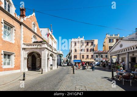 Gibraltar, UK - May 18, 2017: People are walking along the Main street in Gibraltar, United Kingdom, Western Europe. The Convent, official residence o Stock Photo