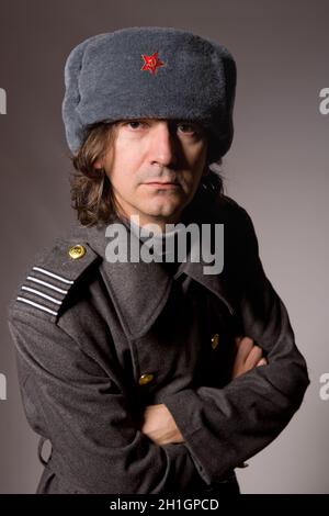 young man dressed as russian military, studio picture Stock Photo