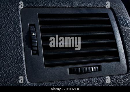 Stove hole in black car interior close up Stock Photo