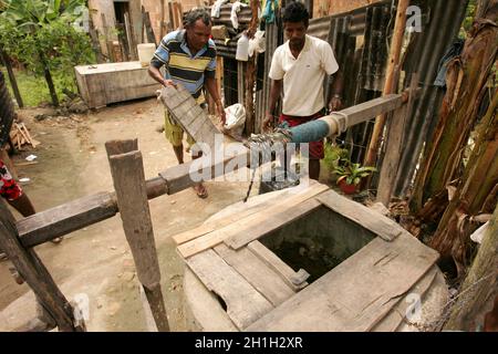 itabela, bahia / brazil - september 9, 2010: people are seen beside a well in a residence in the city of Itabela, in southern Bahia. Stock Photo