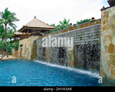 Nusa Dua, Bali, Indonesia - December 30, 2008: View of swimming pool at The Ritz-Carlton Bali Resort Stock Photo