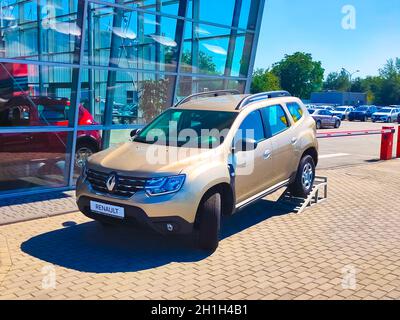 Kyiv, Ukraine - July 29, 2020: Renault salon with sign against blue sky. Renault is known for its role in motor sport, particularly rallying, Formula Stock Photo