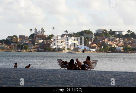salvador, bahia / brazil - august 12, 2015: people are seen at Ribeira beach, in the Penisula de Itapagipe region in the city of Salvador. *** Local C Stock Photo
