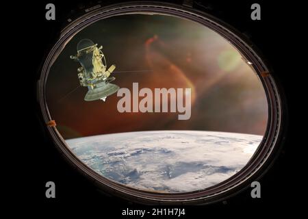 View from porthole. Spacecraft launch into space. Elements of this image furnished by NASA.
