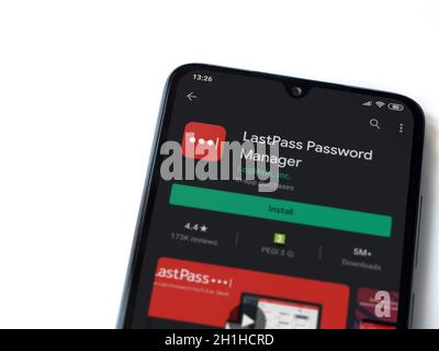 Lod, Israel - July 8, 2020: LastPass Password Manager app play store page on the display of a black mobile smartphone isolated on white background. To Stock Photo